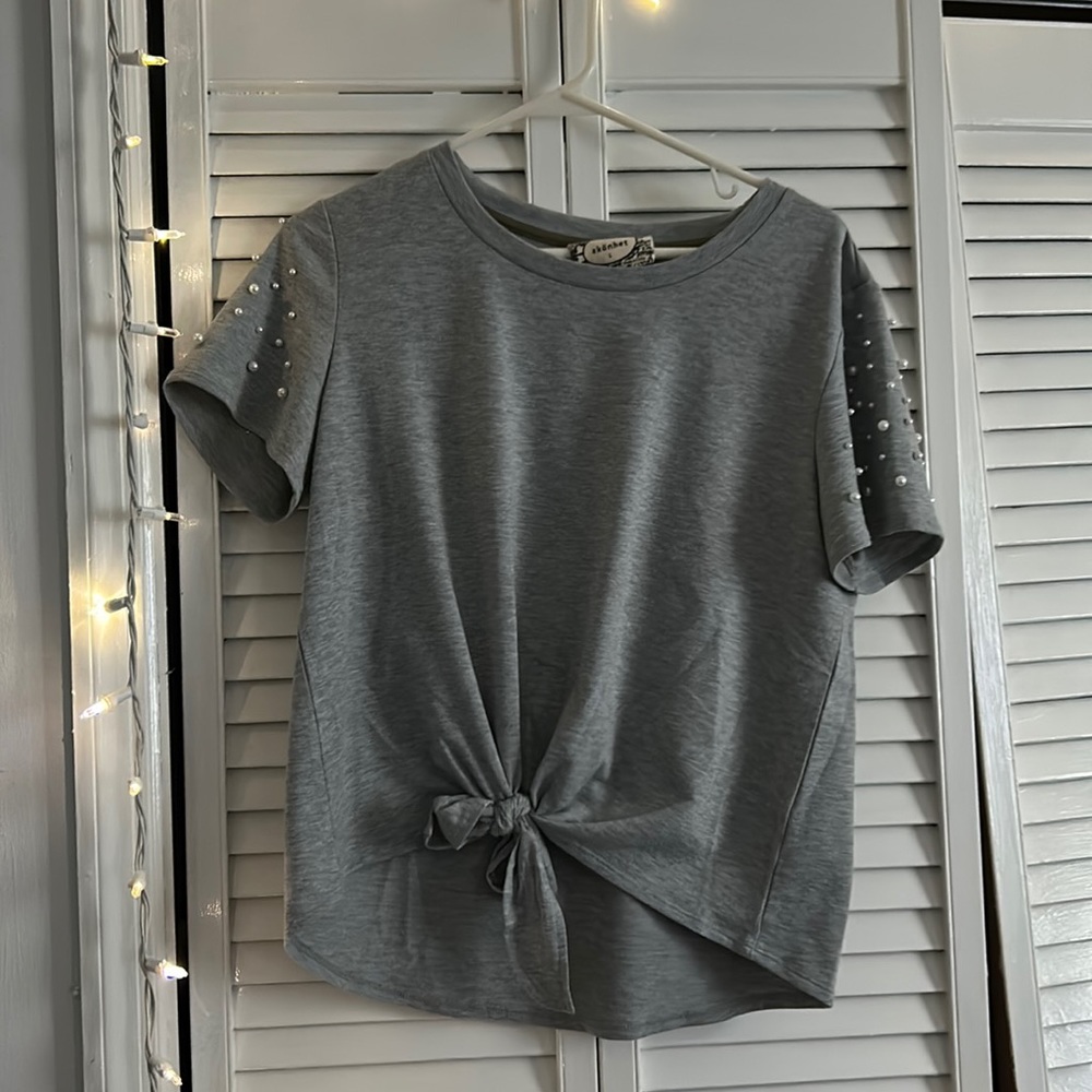 gray top with pearl sleeves, size large